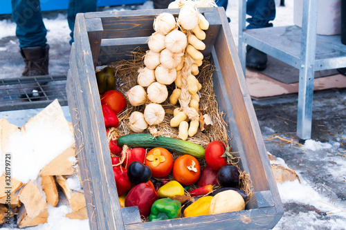  box with artificial vegetables: garlic, pepper, cucumber, pomodor, eggplant photo