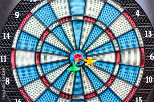 Dartboard with arrows on the center. Business and successful strategy concept