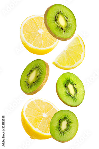 Falling kiwi and lemon isolated on white background.