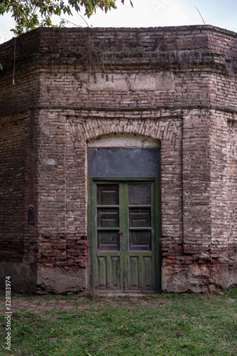 View of an old brick building with openings