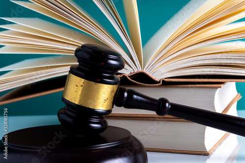 Gavel hammer and book with legally concept.
