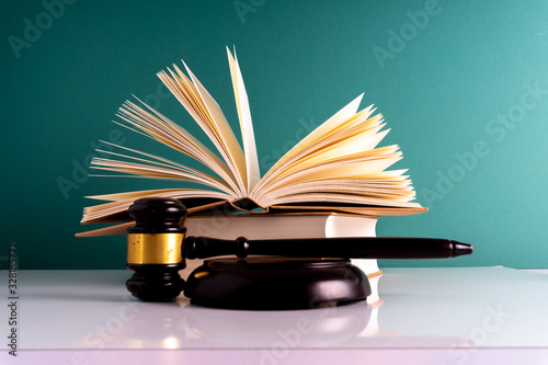 Gavel hammer and book with legally concept.