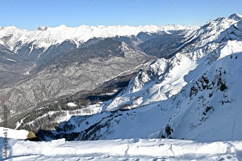snow-capped mountain peaks in a ski resort