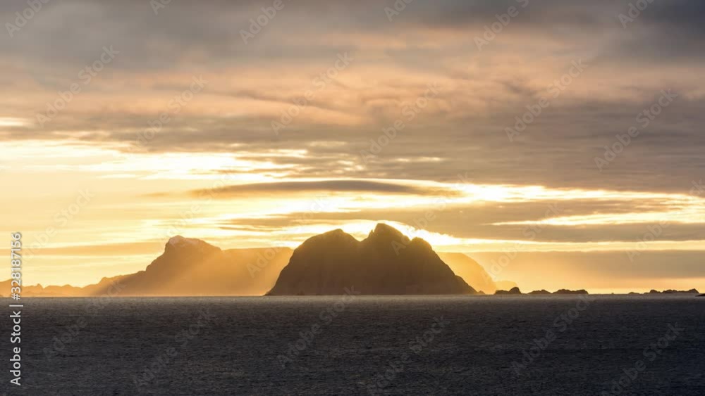 Sunset timelapse of islands at sea Sunset timelapse of islands at sea