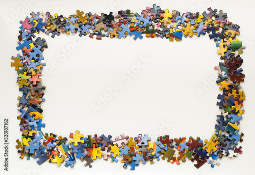 Jigsaw puzzle pieces arranged in a frame