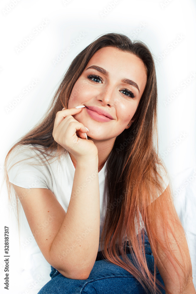 young pretty teenage hipster girl posing emotional happy smiling on white background, lifestyle people concept young pretty teenage hipster girl posing emotional happy smiling on white background, lifestyle people concept
