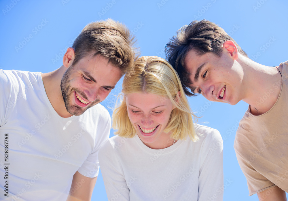 Carefree youth hang out together. See something adorable. Happiness. What is there. Group people excited look down. Woman and men happy sky background. Happiness in unity. Open mind for happiness Carefree youth hang out together. See something adorable. Happiness. What is there. Group people excited look down. Woman and men happy sky background. Happiness in unity. Open mind for happiness