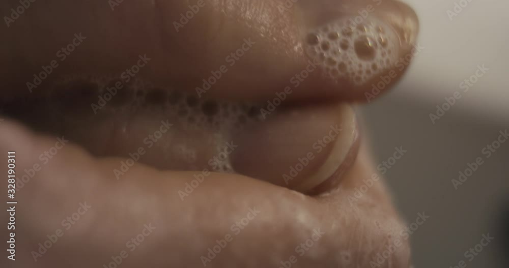 Woman hands washing best way coronavirus covid rub soap macro close up Woman hands washing best way coronavirus covid rub soap macro close up