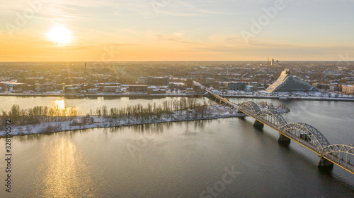 Aerial video from flying drone panoramic to Old Riga, Academy of Sciences, River Daugava and Riga Bridges on a Beautiful Sunny Winter Day (series)