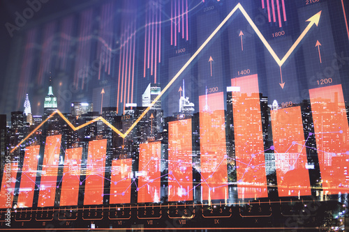 Double exposure of forex chart drawings over cityscape background. Concept of success. © peshkova