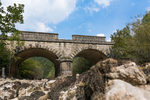 Old stone bridge and dry riverbed in hot summer. Knin in Croatia. © magnetplus