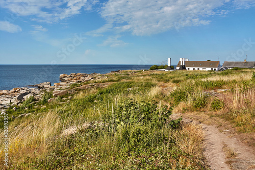 Rocky coast of Baltic Sea in Svaneke, Bornholm island, Denmark.