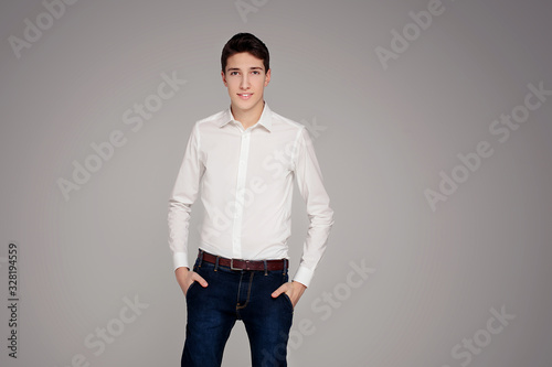 Handsome teenage boy in elegant clothes. © neonshot