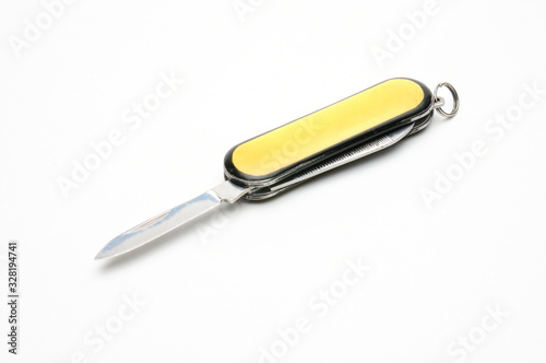 Penknife with scissors on a white background © moviephoto