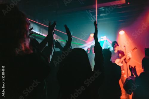 people dancing in night club © NLGomez