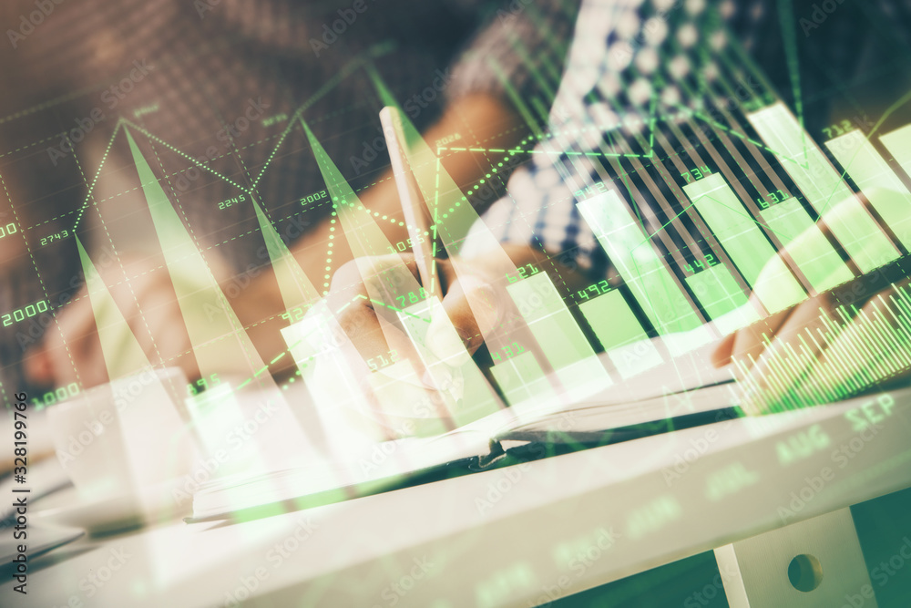Multi exposure of two men planing investment with stock market forex chart. Multi exposure of two men planing investment with stock market forex chart.