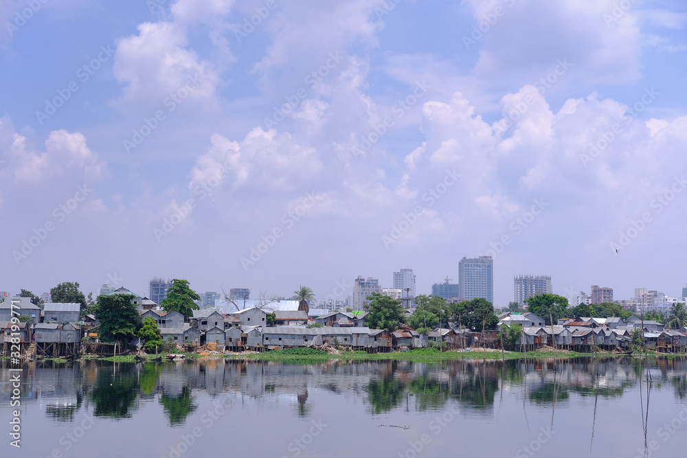 Naklejka premium view of poor residential area on river bank in dhaka in bangladesh 
