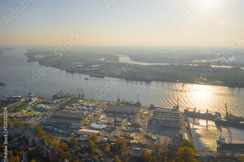 Riga, Latvia – October 3 2019: Beautiful Aerial panoramic view photo from flying drone of Vecmilgravis district in beautiful autumn sunset in Riga, Latvia