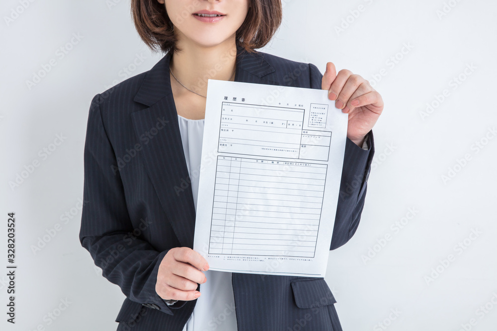 スーツを着た女性 履歴書 就活活動 パート 主婦 woman Stock 写真 