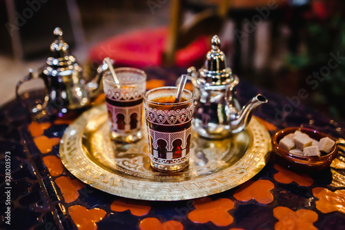 Fototapeta Naklejka Na Ścianę i Meble -  traditional Arabic tea cup, arab people drinking tea in Ramadan