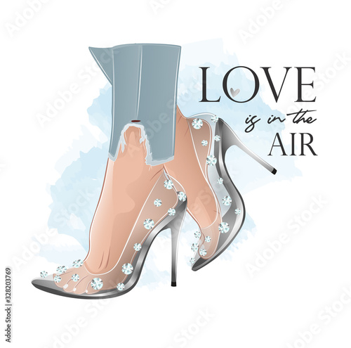 lady wearing silver highheeled shoes with diamonds photo