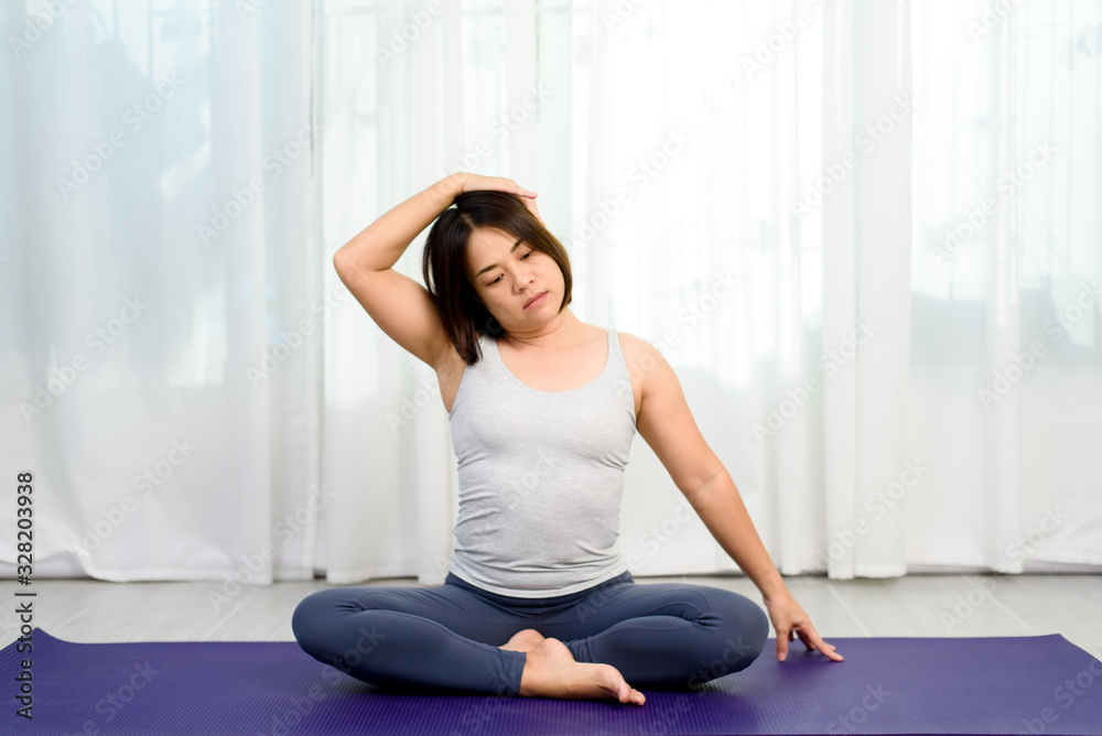 Woman do yoga training in a room Woman do yoga training in a room