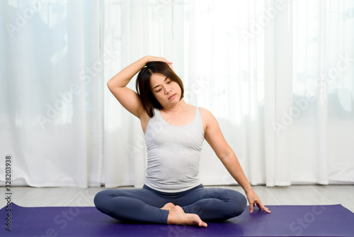 Woman do yoga training in a room