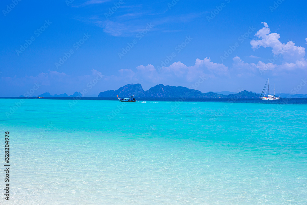 Beautiful summer beach with clear water and blue sky in south of thailand