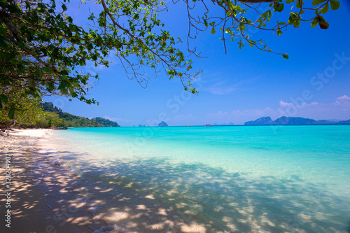 Beautiful summer beach with clear water and blue sky in south of thailand © gee1999