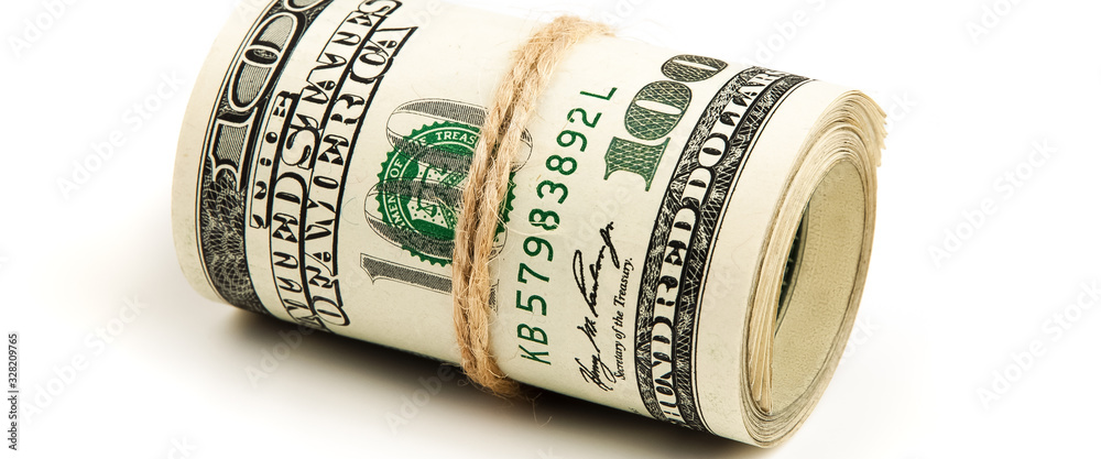 Roll of US dollars on a white background, isolated. Roll of US dollars on a white background, isolated.