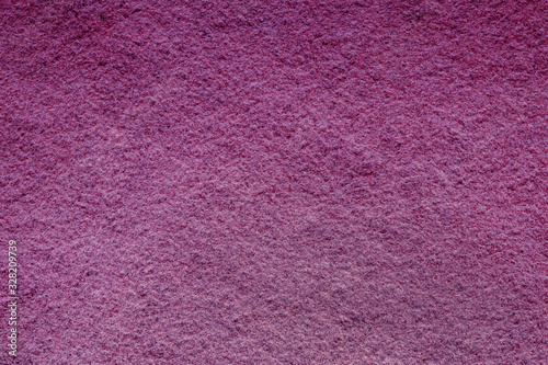 Purple felt soft rough textile material background texture close up. Colorful felt texture for background with copy space. Felt fabric sheet