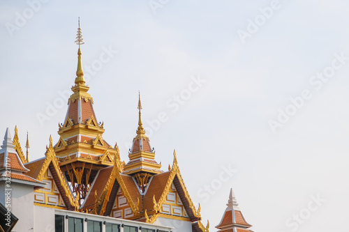 Canvas Print beautiful spire temple roof golden color on white background  isolate in Thailan