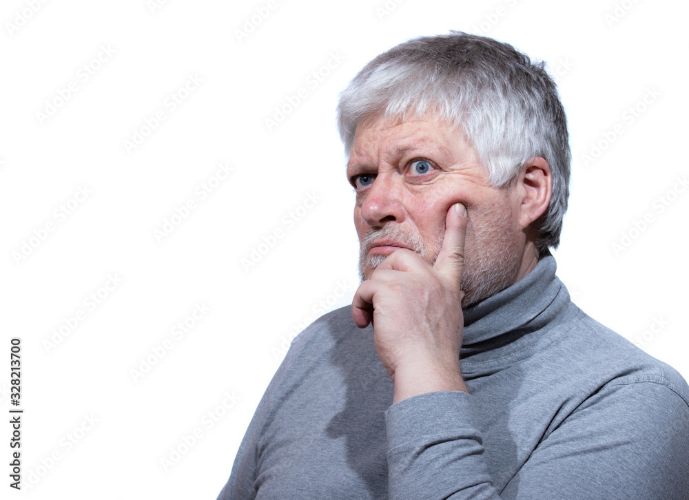 Portrait of an older man. He rested his head thoughtfully on one hand. Portrait of an older man. He rested his head thoughtfully on one hand.