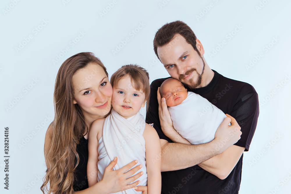 the concept of a healthy lifestyle, the protection of children, shopping - baby in the arms of the mother and father. Woman and man holding a child. Isolated on white background. Copy space. Portrait the concept of a healthy lifestyle, the protection of children, shopping - baby in the arms of the mother and father. Woman and man holding a child. Isolated on white background. Copy space. Portrait
