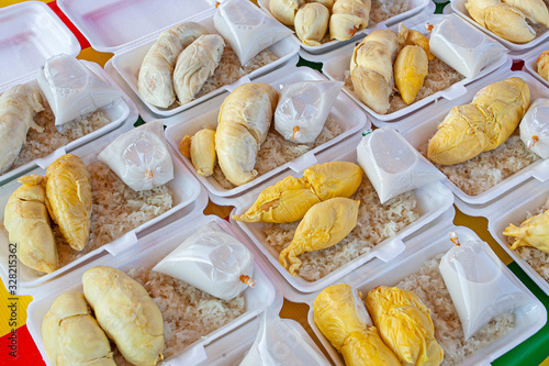 Durian with rice and sause - traditional malaysian food in market photo