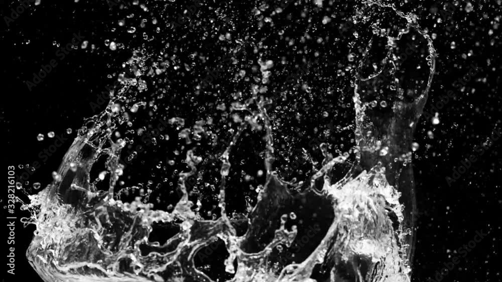 Slow motion of water splash abstract particle on black background