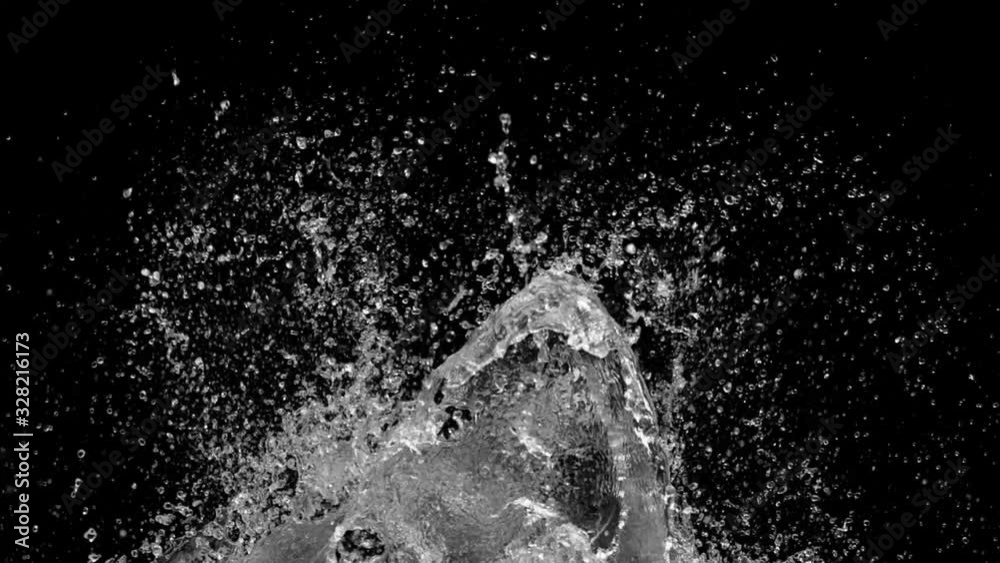 Slow motion of water splash abstract particle on black background