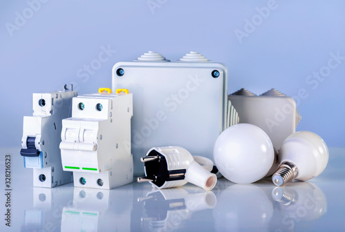 Electrical equipment on blue background. Various electric products on the store shelve.