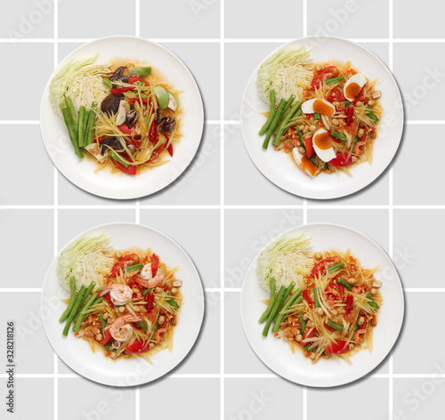 Spicy crab papaya salad, Sea crab Somtum Salad, Thai food on gray background