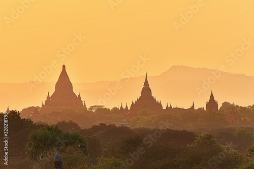 Scenic and stunning sunrise at Archaeological Zone over Bagan in Myanmar. Bagan is an ancient city and World Heritage Site certified by UNESCO with thousands of historic buddhist temples