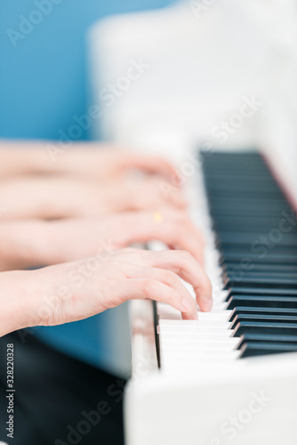 Playing the piano with both hands