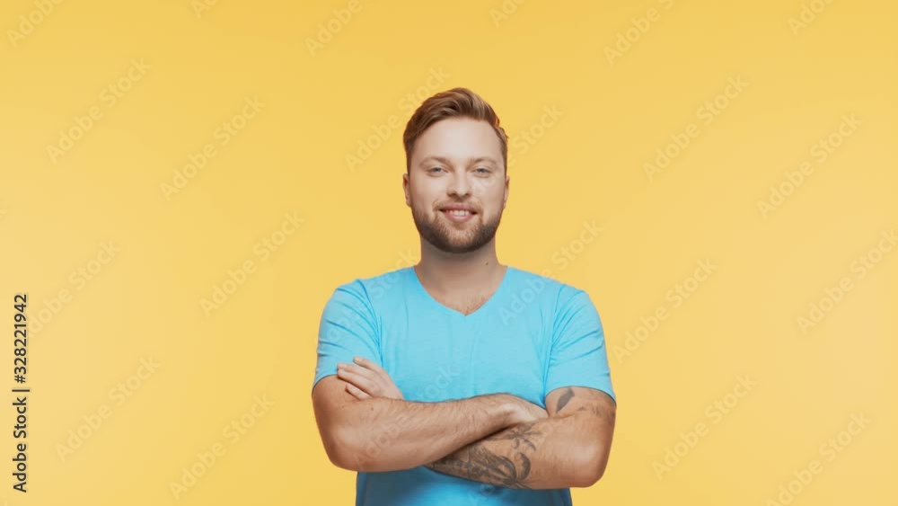 Expressive young man over vibrant background. Studio portrait of handsome person.