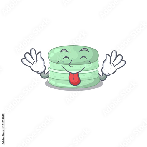 Funny pistachio macaron mascot design with Tongue out