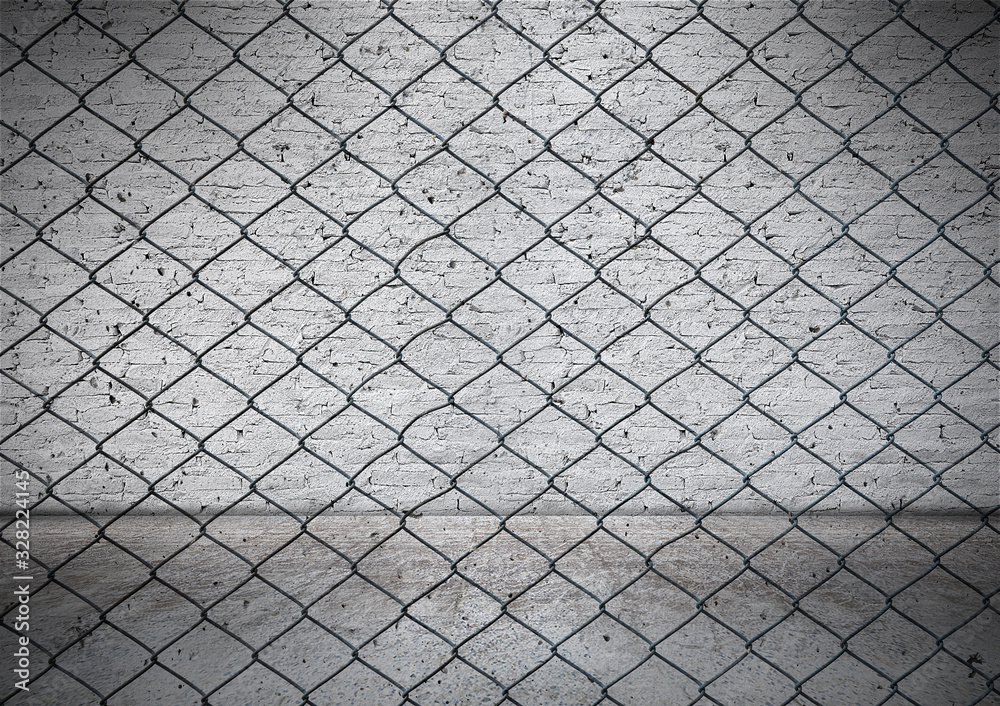 Fototapeta premium Wire fence with Old white brick wall background.