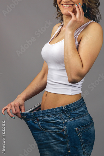 Woman trying jeans photo