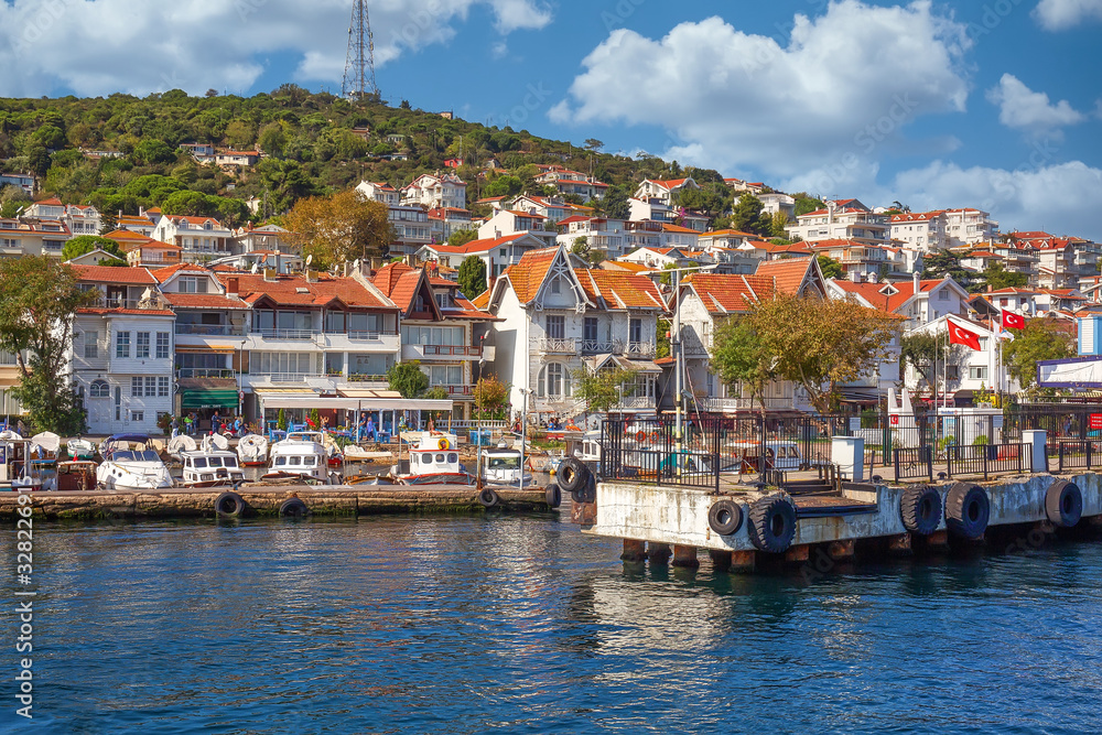 Obraz premium PRINCES ISLANDS, TURKEY - October 10th, 2019: View to beautiful island of Heibeliada on warm and sunny autumn day