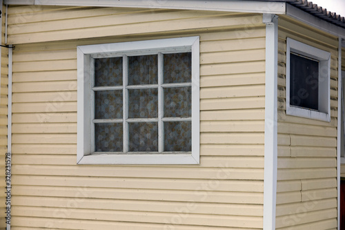 Cladding  partly covered with mould