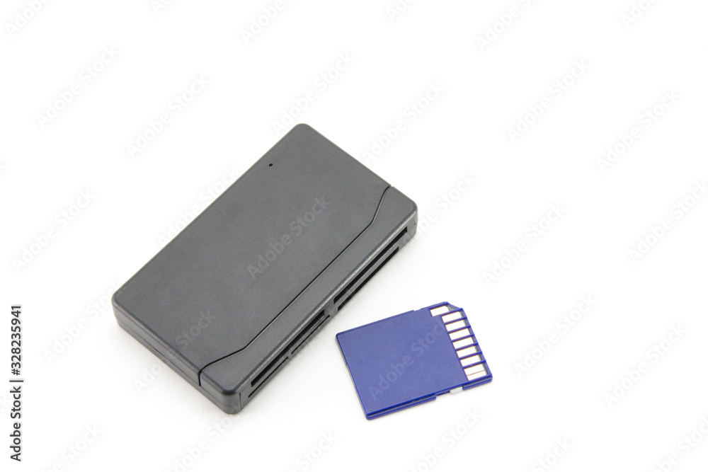 The adapter, the card reader is rectangular, black for all types of flash cards and storage devices. With a blue flash card nearby. For transferring data from mini cd. On a white isolated background The adapter, the card reader is rectangular, black for all types of flash cards and storage devices. With a blue flash card nearby. For transferring data from mini cd. On a white isolated background