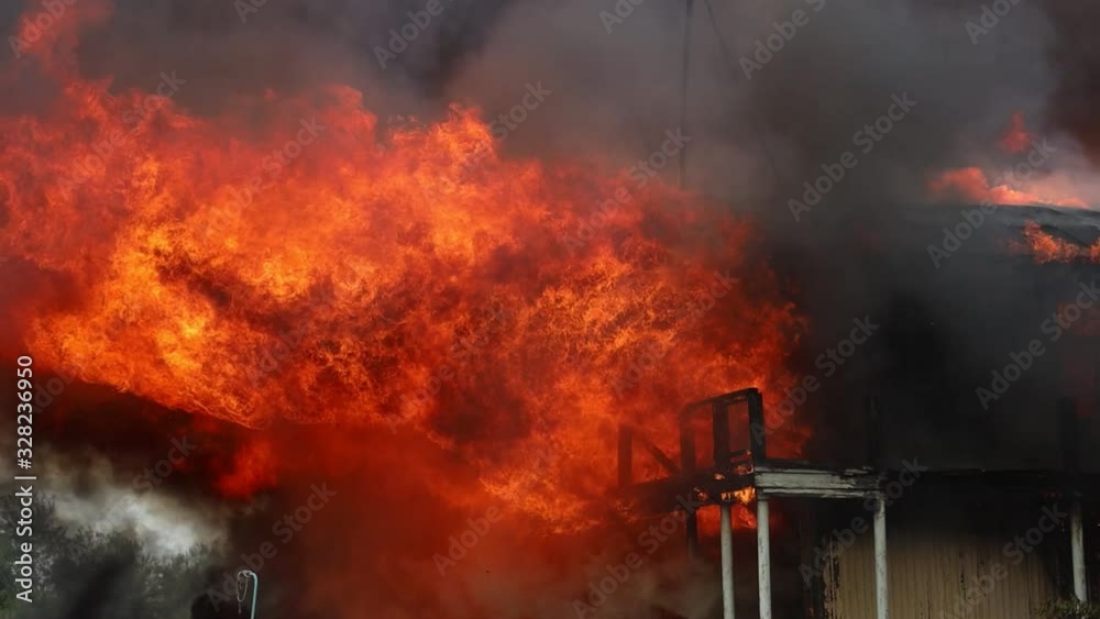 big fire with black smoke aerial top panoramic view sky fly