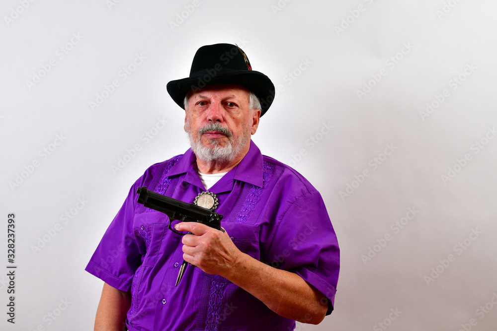 Serious looking man with a 9mm automatic pistol is making an offer that can't be refused. Serious looking man with a 9mm automatic pistol is making an offer that can't be refused.